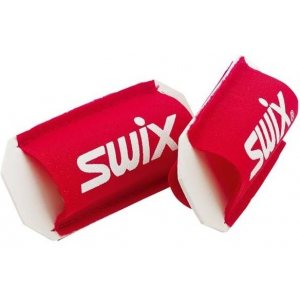 Attaches skis