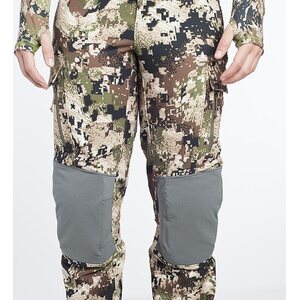 The fit is athletic with tapered legs and a low-profile waist that won’t bunch or chafe under a pack.